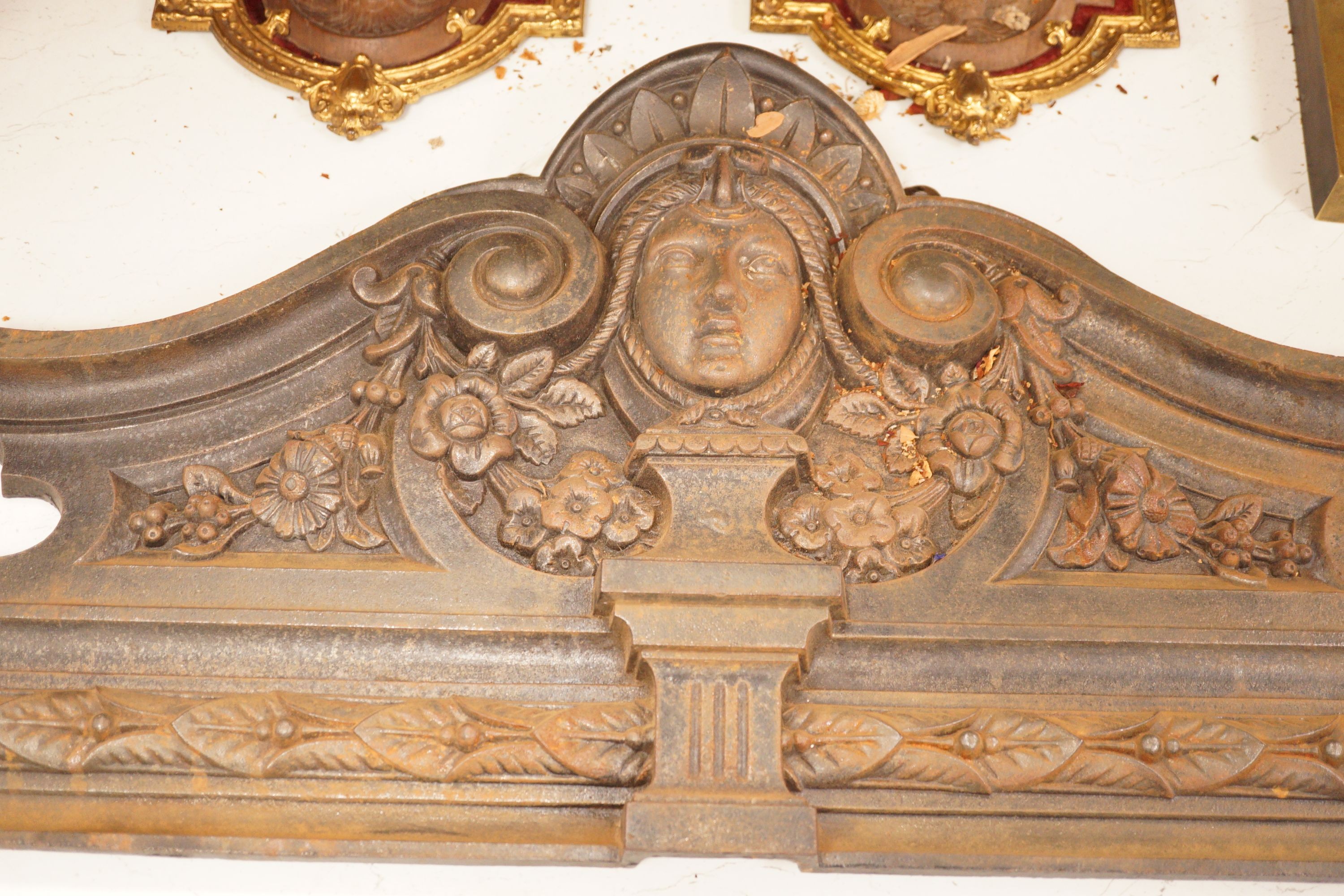 A wall mounted cast iron architectural pediment, 101cm